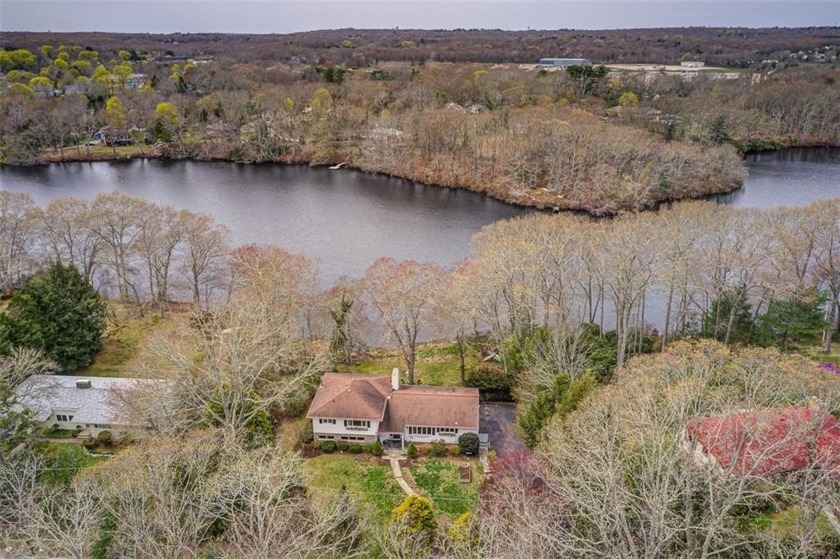 An exceptional waterfront split ranch home nestled in the - Beach Home for sale in South Kingston, Rhode Island on Beachhouse.com