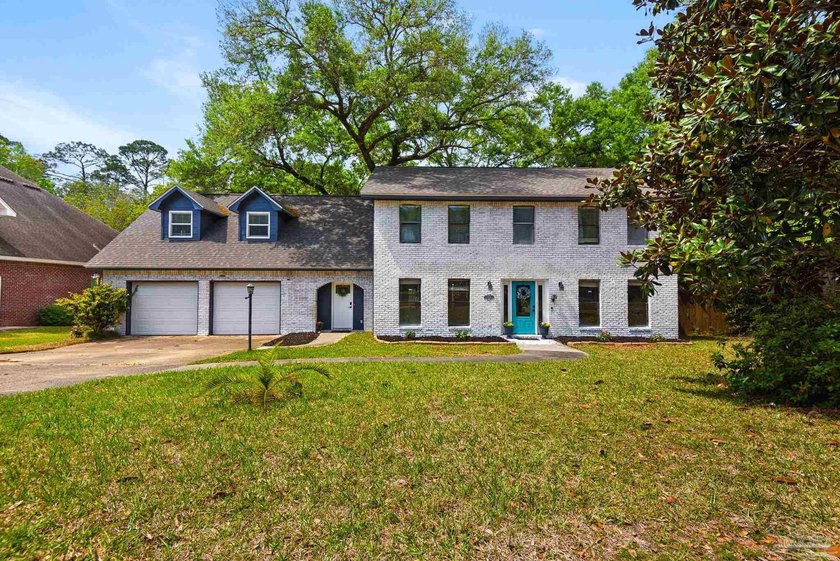 Beautifully updated 5BR/3BA creekside home on nearly half an - Beach Home for sale in Pensacola, Florida on Beachhouse.com