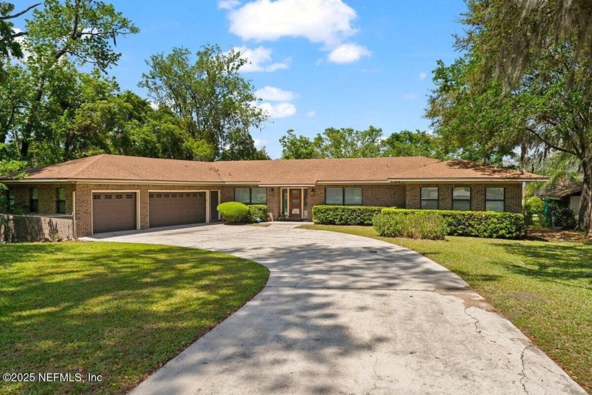 This stunning 3 bedroom, 3 bathroom all-brick home sits on a - Beach Home for sale in Jacksonville, Florida on Beachhouse.com