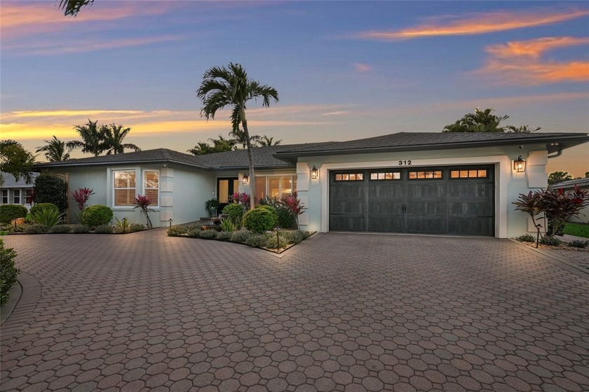 ABSOLUTELY STUNNING 4 BEDROOM WATERFRONT POOL HOME ON BELAIR - Beach Home for sale in Bradenton, Florida on Beachhouse.com