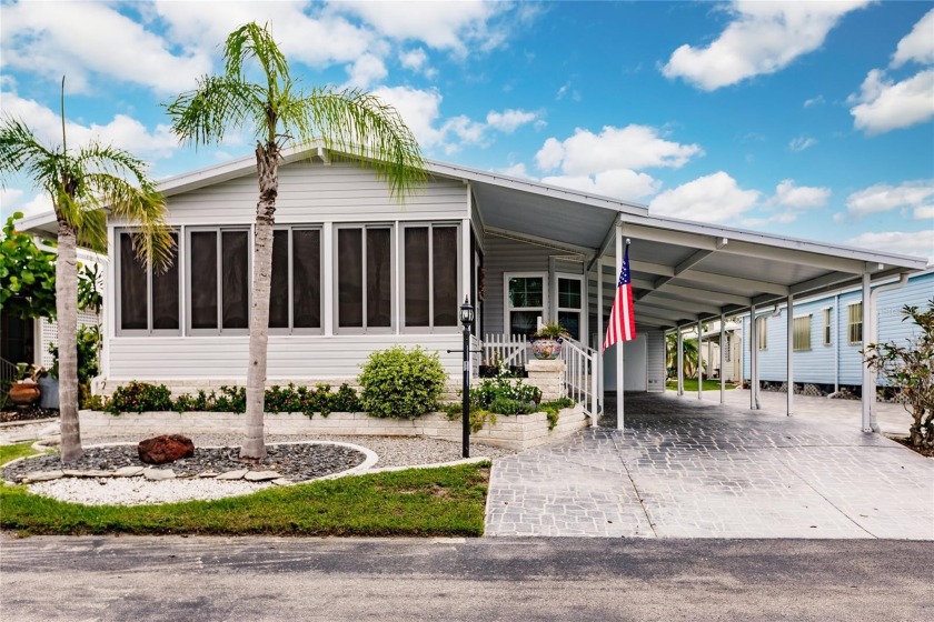 Welcome to your new home in Burnt Store Colony, a vibrant 55+ - Beach Home for sale in Punta Gorda, Florida on Beachhouse.com