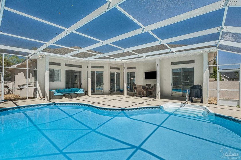 This beautifully remodeled Grand Pointe home presents a rare - Beach Home for sale in Gulf Breeze, Florida on Beachhouse.com