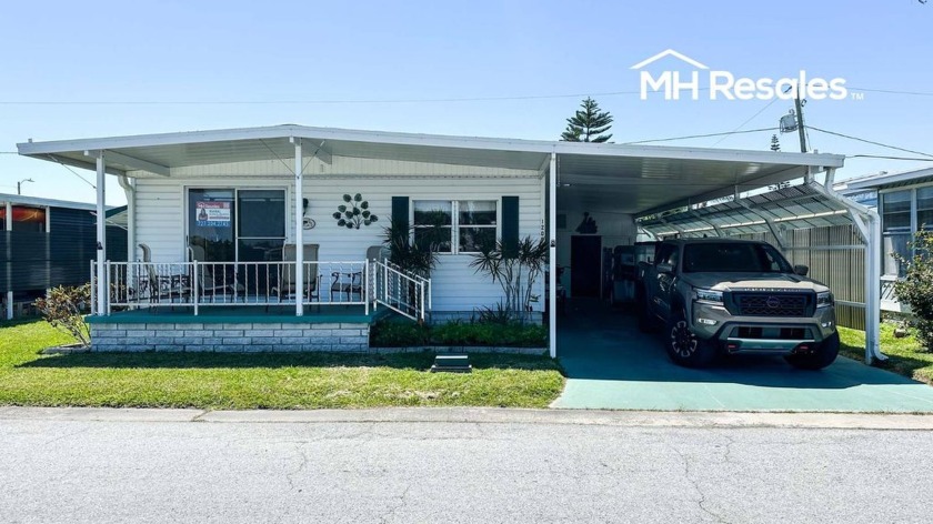 Discover the allure of serene waterfront living in this fully - Beach Home for sale in Clearwater, Florida on Beachhouse.com