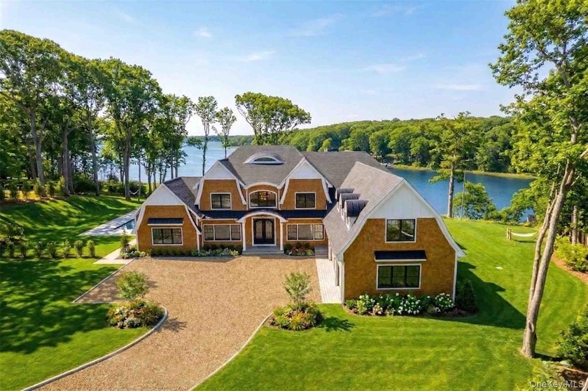 Welcome to 106 Cove Road in the Village of Asharoken. Set on 2 - Beach Home for sale in Northport, New York on Beachhouse.com