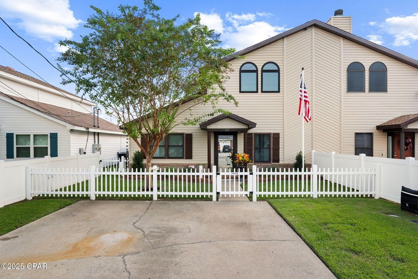 This beautifully updated 3-bedroom, 2-bathroom home features a - Beach Townhome/Townhouse for sale in Lynn Haven, Florida on Beachhouse.com
