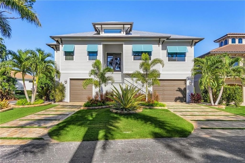 Welcome to this impeccably designed coastal residence in the - Beach Home for sale in Bonita Springs, Florida on Beachhouse.com