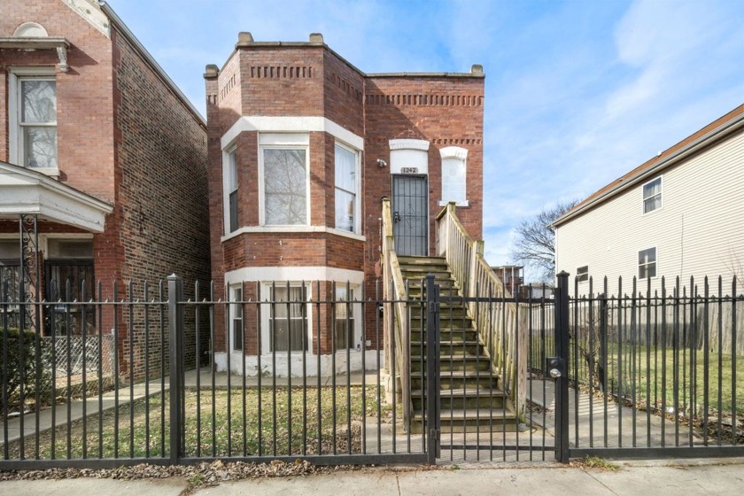 Brick two flat on a quiet street ready for it's next owner. Roof - Beach Home for sale in Chicago, Illinois on Beachhouse.com