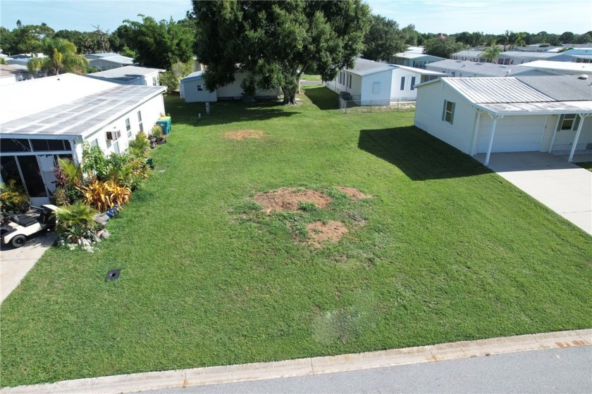 This cleared lot is ready for your vision! Ideal location for - Beach Lot for sale in Barefoot Bay, Florida on Beachhouse.com