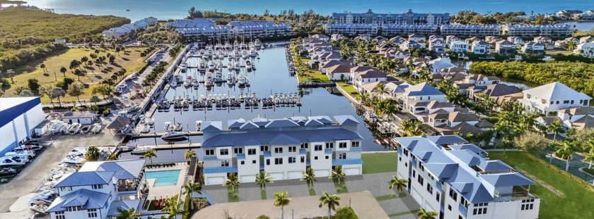 This chic two-story home divides space for peaceful living. The - Beach Home for sale in Ruskin, Florida on Beachhouse.com