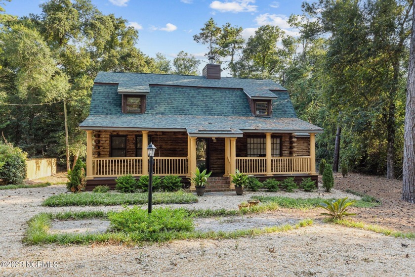 Lovely modernized log cabin at the beach! 
This 4 bedroom home - Beach Home for sale in Pine Knoll Shores, North Carolina on Beachhouse.com