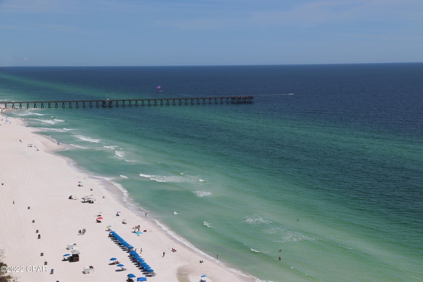 FULLY FURNISHED, RENTAL READY. Large Living Room, mirror walls - Beach Condo for sale in Panama City Beach, Florida on Beachhouse.com