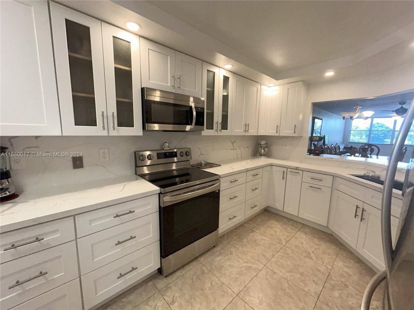 Beautifully remodeled 3 bedroom 2 bath first floor unit WITH - Beach Condo for sale in Sunrise, Florida on Beachhouse.com