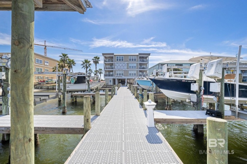 Rare front facing, DIRECT WATERFRONT unit at Portside, a low - Beach Condo for sale in Orange Beach, Alabama on Beachhouse.com