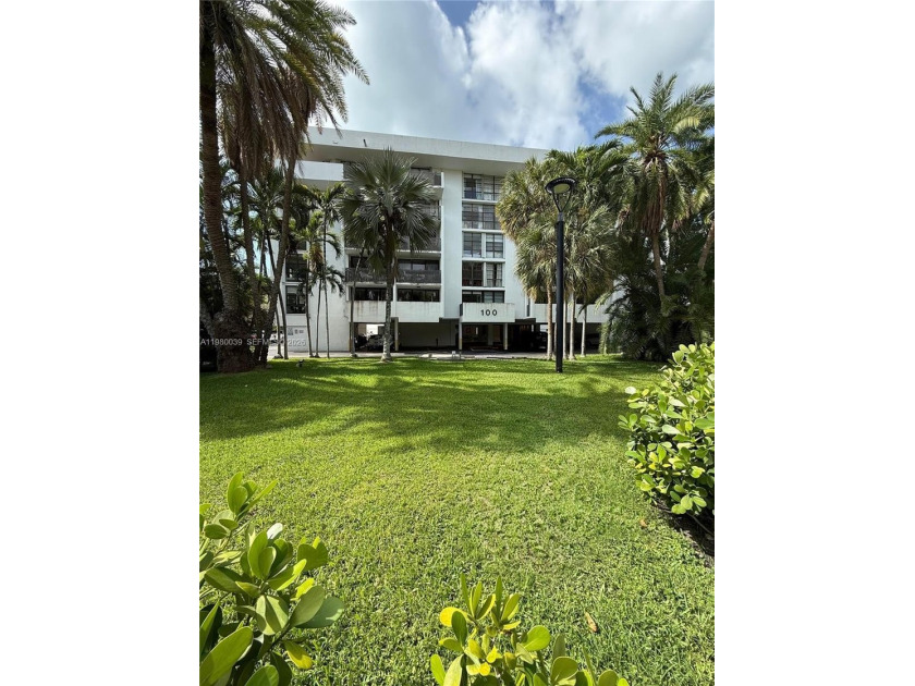 Experience the pinnacle of island living, a stunning coastal - Beach Condo for sale in Key Biscayne, Florida on Beachhouse.com