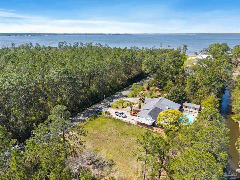 Don't miss this rare opportunity to own a cleared, canal-front - Beach Lot for sale in Pensacola, Florida on Beachhouse.com