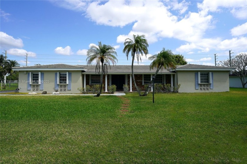Discover the potential of this 4-bedroom, 3-bath canal-front - Beach Home for sale in Palmetto Bay, Florida on Beachhouse.com