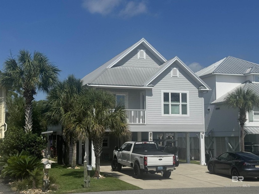 A unique one owner treasure in the heart of Orange Beach. This 4 - Beach Home for sale in Orange Beach, Alabama on Beachhouse.com