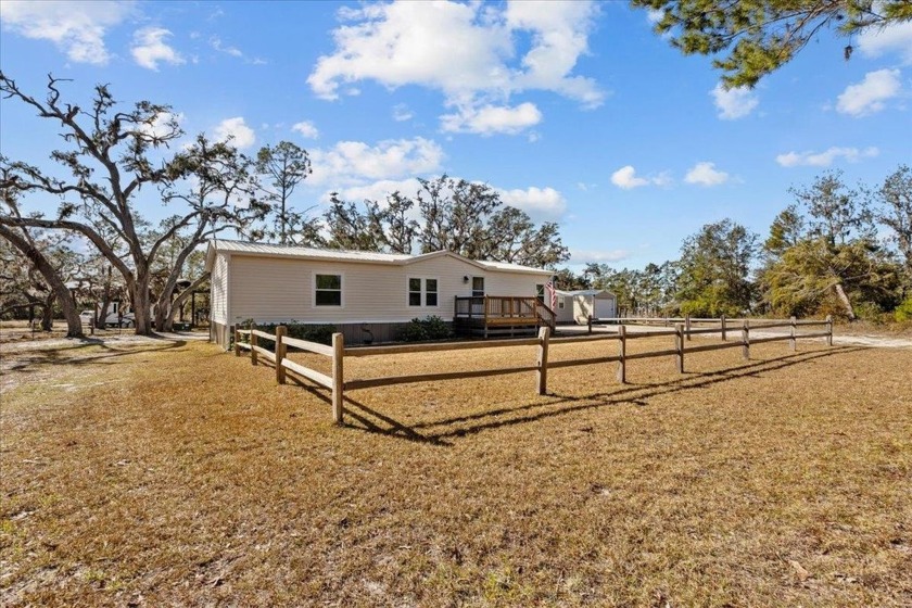 Here's the revised version with your additions:    ---  Nestled - Beach Home for sale in Keaton Beach, Florida on Beachhouse.com