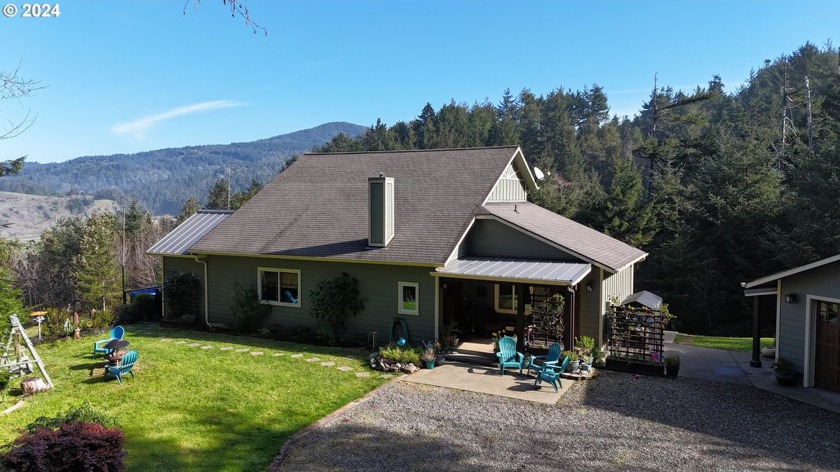 Stunning, elegant, ideal family or vacation home situated along - Beach Home for sale in Gold Beach, Oregon on Beachhouse.com