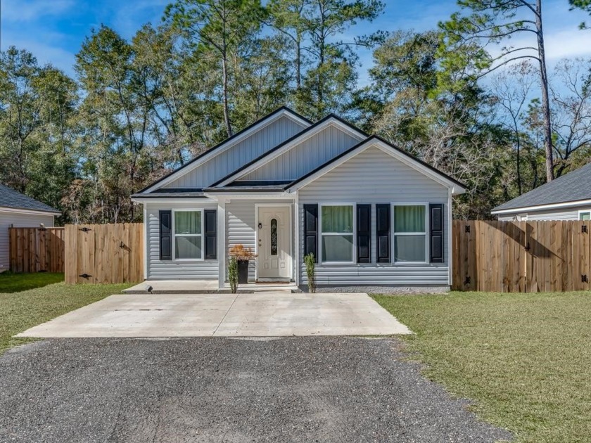 Nestled just 300 feet from the tranquil shores of the hidden gem - Beach Home for sale in Crawfordville, Florida on Beachhouse.com