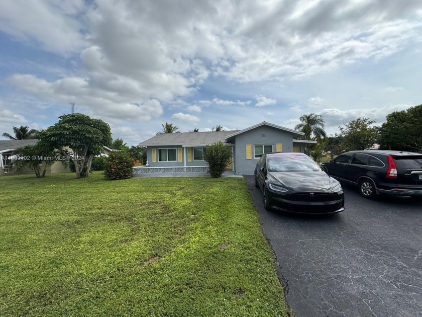 Welcome to Your Dream Home! This stunning residence has spacious - Beach Home for sale in Tamarac, Florida on Beachhouse.com