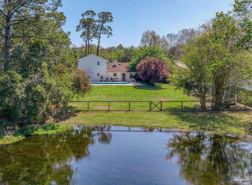 Lakefront Pool Home in Whisper Bay | Gulf Breeze School District - Beach Home for sale in Gulf Breeze, Florida on Beachhouse.com