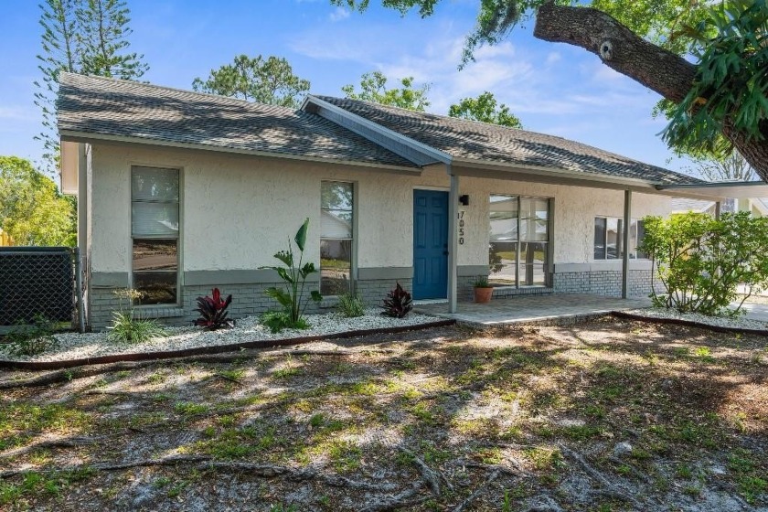 True Florida living awaits! This beautifully renovated 3-bedroom - Beach Home for sale in New Port Richey, Florida on Beachhouse.com