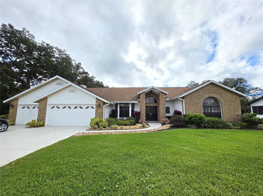 This 4 bed 2.5 bath home is in the gated Community of Glen lakes - Beach Home for sale in Weeki Wachee, Florida on Beachhouse.com