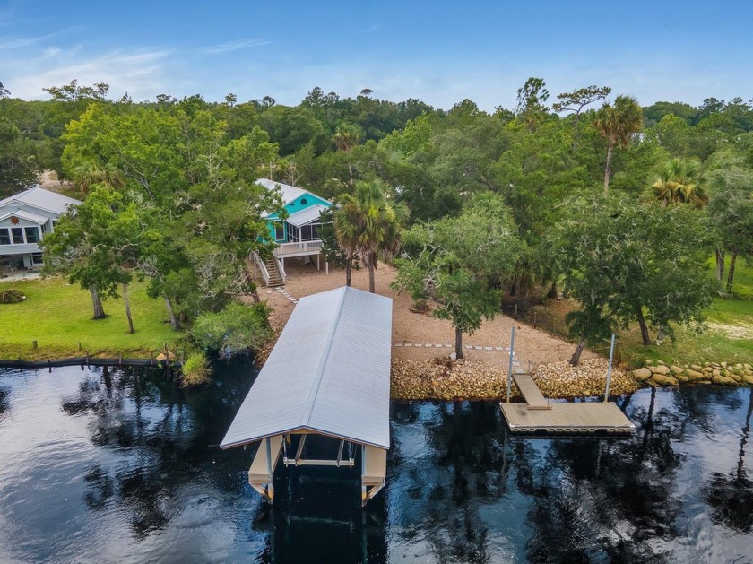 This absolutely stunning riverfront home built in 2000 on 0.88 - Beach Home for sale in Steinhatchee, Florida on Beachhouse.com