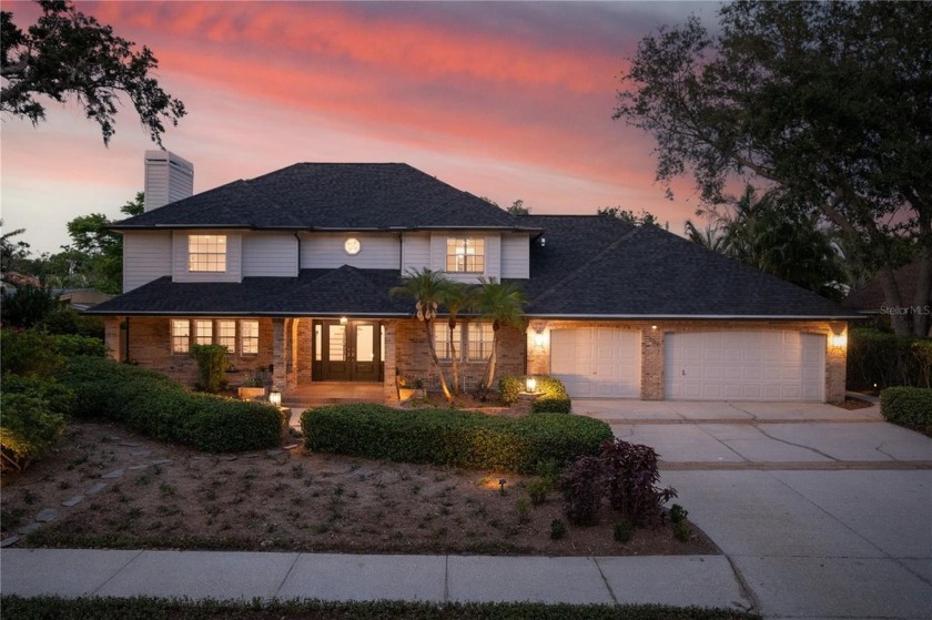 This stunning home is an incredible opportunity to own a - Beach Home for sale in Belleair Beach, Florida on Beachhouse.com