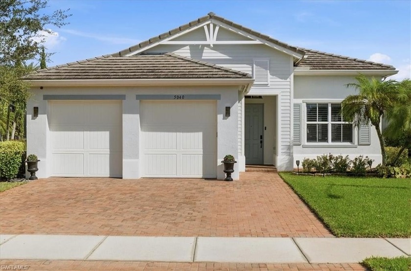 WELCOME HOME to this beautifully enhanced, upgraded Almanor home - Beach Home for sale in Ave Maria, Florida on Beachhouse.com