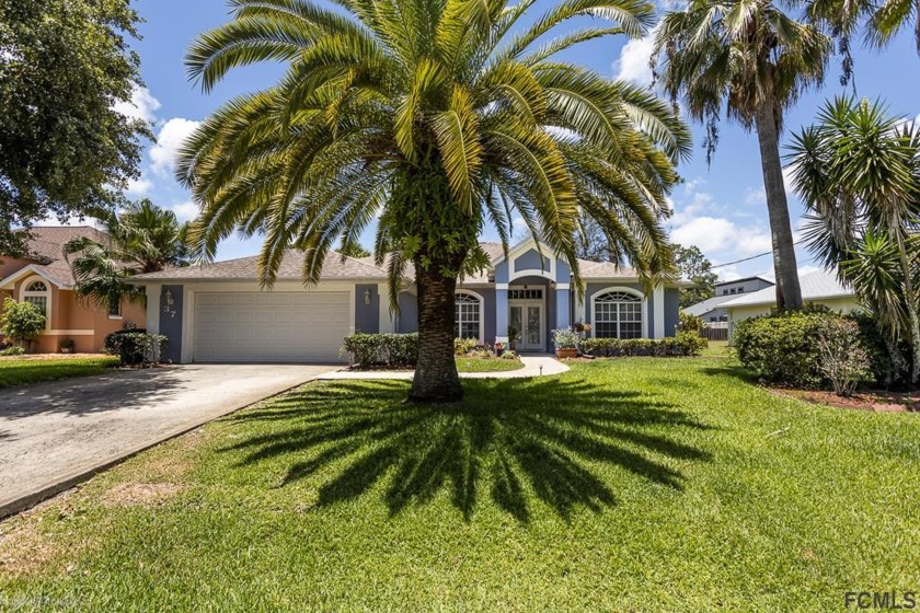 Beautiful house.  Great neighborhood. Beautiful landscaping.  So - Beach Home for sale in Palm Coast, Florida on Beachhouse.com