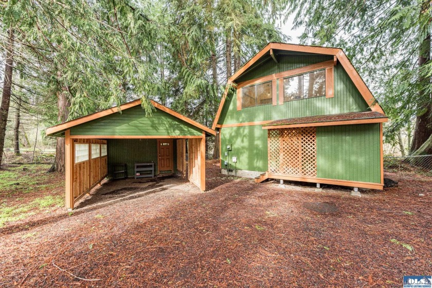 A unique cottage nestled in the trees by serene Solmar Lake - Beach Home for sale in Sequim, Washington on Beachhouse.com