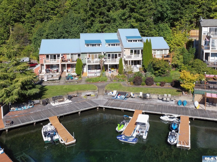 Bring your kayaks & paddle boards to this gated Lake Sutherland - Beach Condo for sale in Port Angeles, Washington on Beachhouse.com