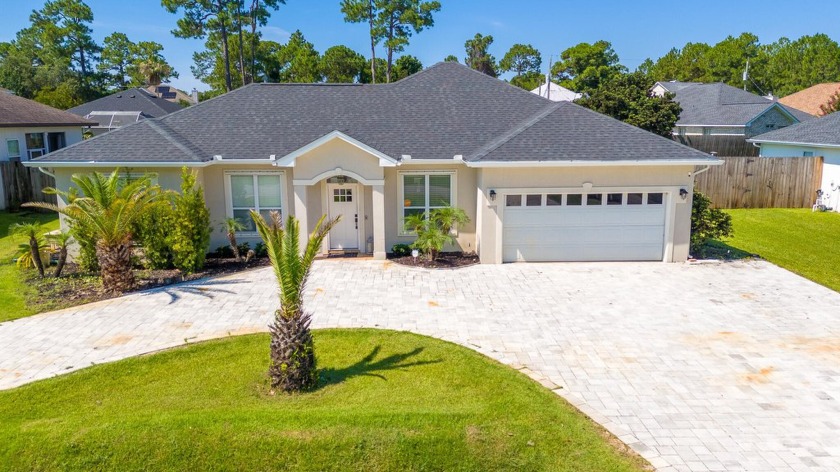 Located in a quiet, no-HOA neighborhood in Miramar Beach, this - Beach Home for sale in Miramar Beach, Florida on Beachhouse.com