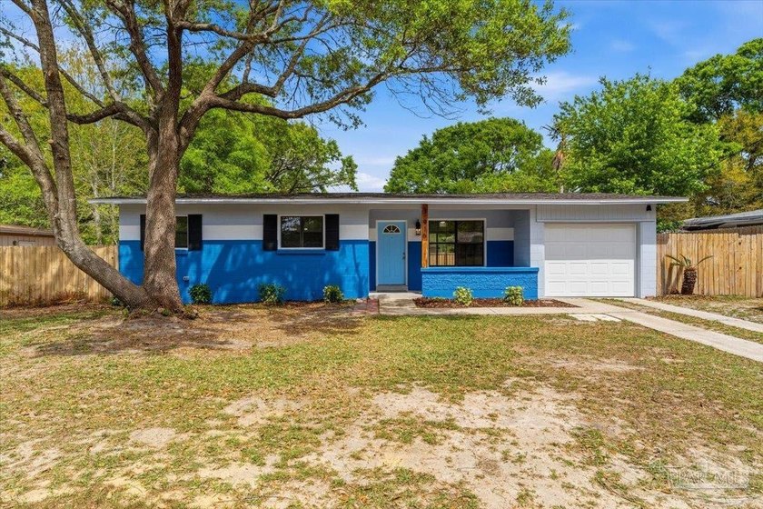 Tucked beneath mature naval oaks, this fully renovated 3-bedroom - Beach Home for sale in Pensacola, Florida on Beachhouse.com