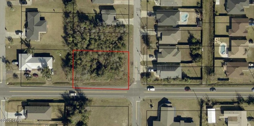 This wooded lot with 150 LF of highway frontage sits on a highly - Beach Commercial for sale in Lynn Haven, Florida on Beachhouse.com