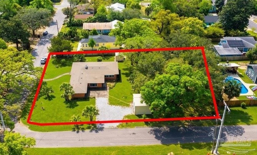 Solidly built mid-century home sits on a rare half-acre corner - Beach Home for sale in Pensacola, Florida on Beachhouse.com