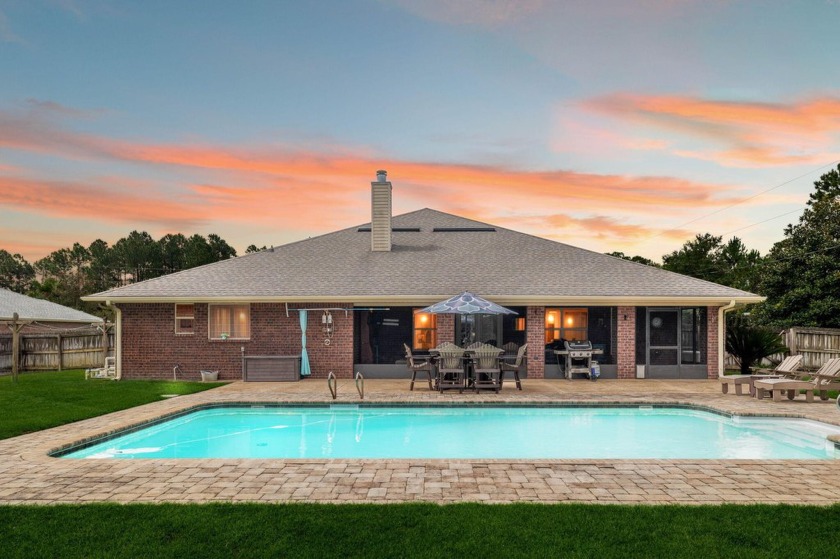 Welcome to 7522 Treasure Street -- a stunning, custom-crafted - Beach Home for sale in Navarre, Florida on Beachhouse.com