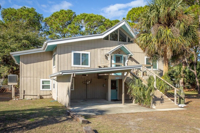 Escape to this charming canal-front retreat on Alligator Point - Beach Home for sale in Alligator Point, Florida on Beachhouse.com