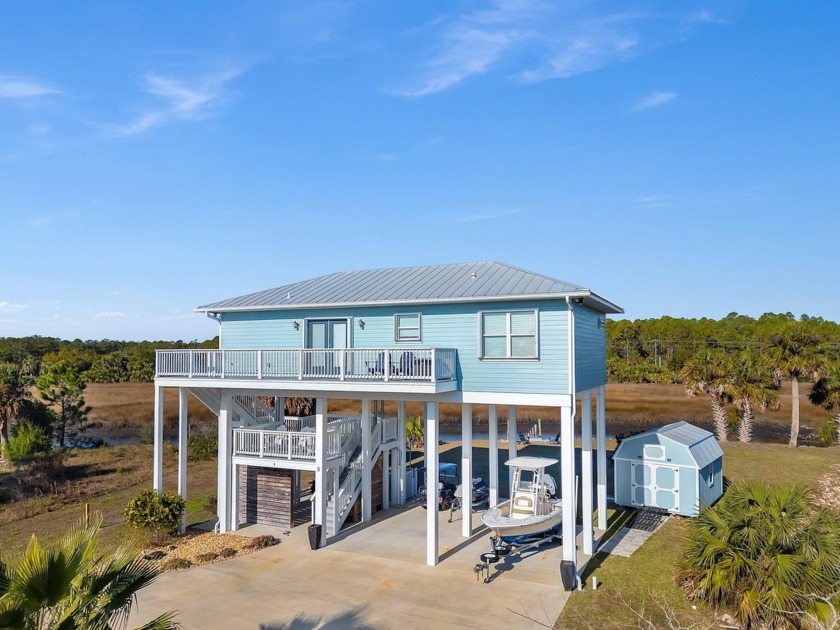 NEW PICTURES COMING ON 8TH! Immaculate Canal front Home with - Beach Home for sale in Crawfordville, Florida on Beachhouse.com