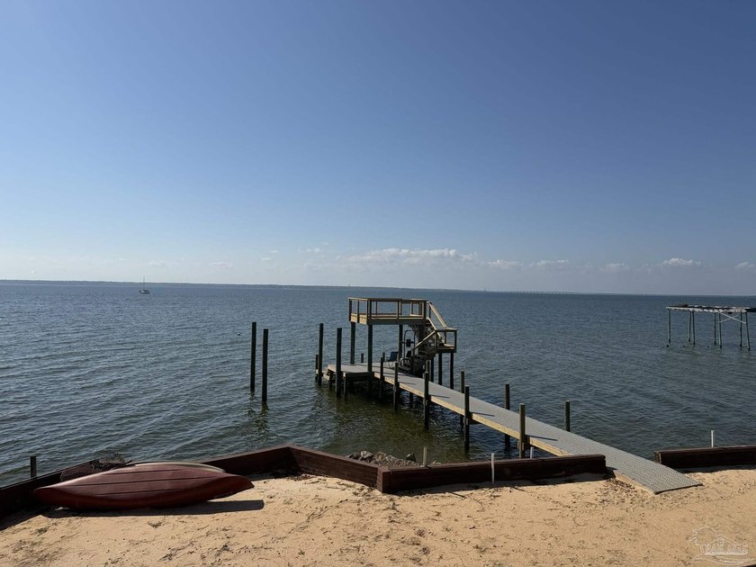 Beautiful bayfront estate on Escambia Bay, ideally located just - Beach Home for sale in Milton, Florida on Beachhouse.com