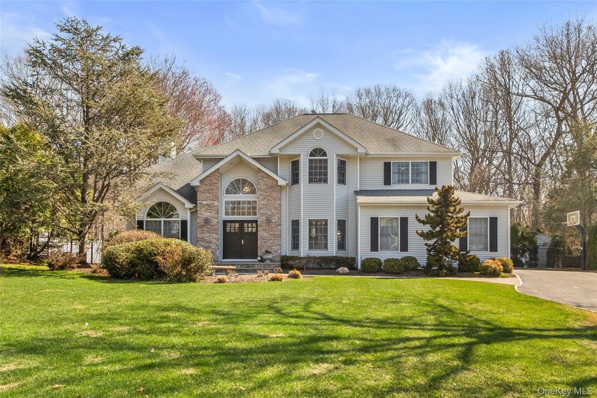 Welcome to 24 Ramsey Court, a beautifully appointed Colonial - Beach Home for sale in East Setauket, New York on Beachhouse.com