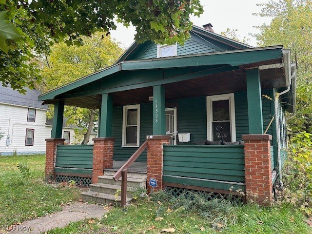 This single family home features five bedrooms and two full - Beach Home for sale in Cleveland, Ohio on Beachhouse.com