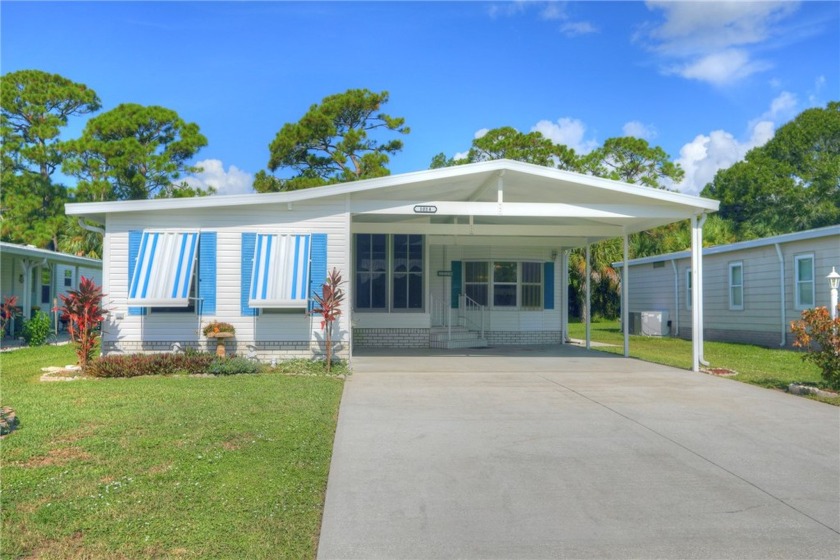 Extra deep lot plus double carport. Spacious raised enclosed - Beach Home for sale in Barefoot Bay, Florida on Beachhouse.com