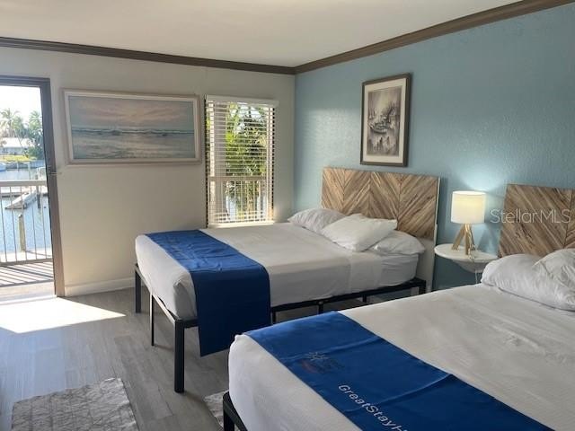 WATER-VIEW condo-hotel room located within the Ramada by Wyndham - Beach Condo for sale in Sarasota, Florida on Beachhouse.com