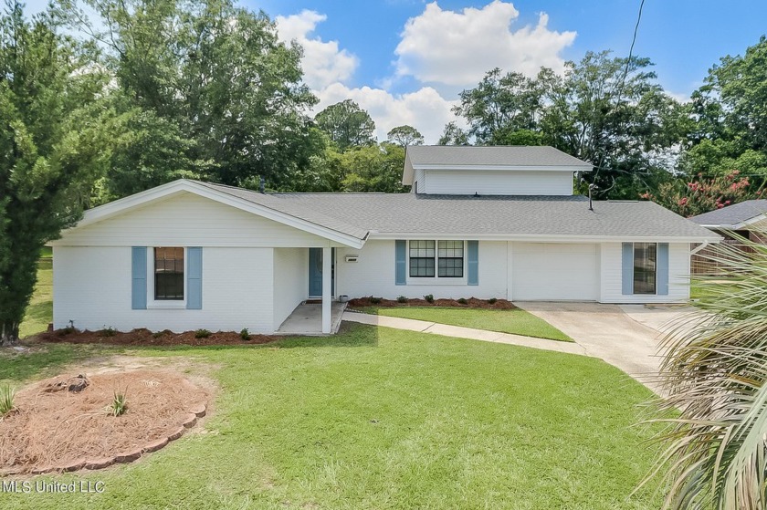 Welcome to this charming home in Bayou View. Featuring tasteful - Beach Home for sale in Gulfport, Mississippi on Beachhouse.com