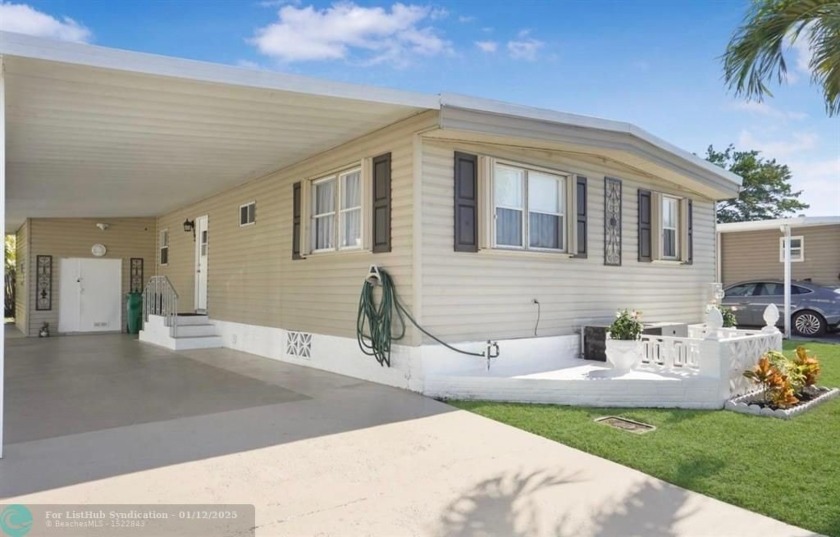 Welcome to your stunning 2-bedroom, 2-bath mobile home in the - Beach Home for sale in Davie, Florida on Beachhouse.com