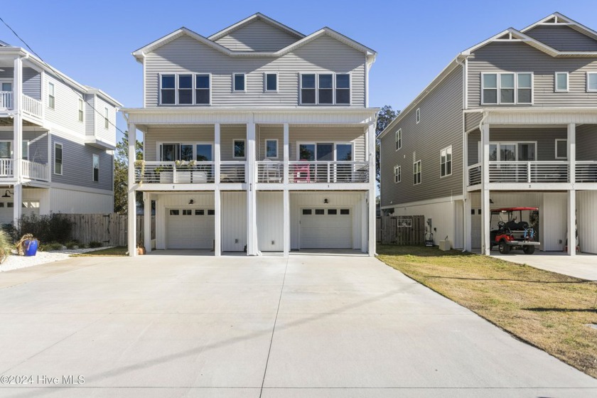 Welcome to this beautiful island retreat, a meticulously - Beach Townhome/Townhouse for sale in Carolina Beach, North Carolina on Beachhouse.com