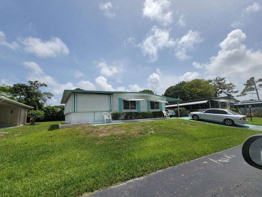 Located in Sea Meadow, a 55 plus community. Lot rent is $833 - Beach Home for sale in Boynton Beach, Florida on Beachhouse.com